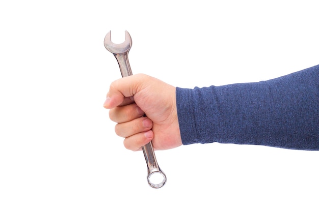 A mans hand holds a wrench isolated on a white background