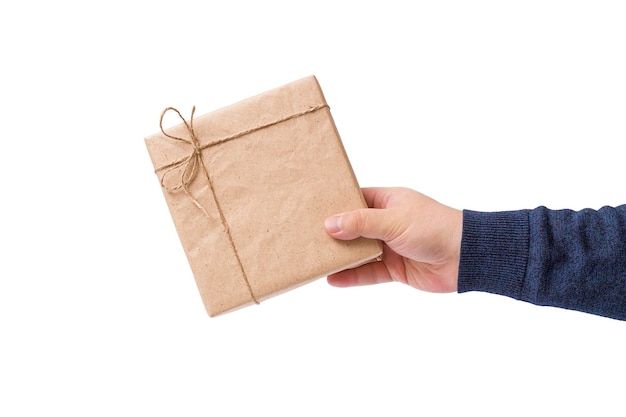 A mans hand with a gift isolated on a white background