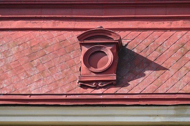 Photo mansard auditory skylight as a roof decoration