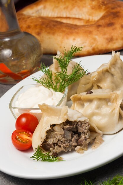 Manti or manty with chopped lamb and onion