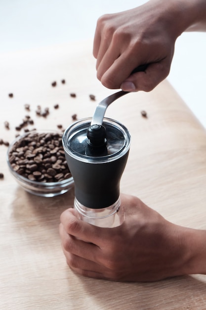 Manual grinder for coffee beans for home brewer