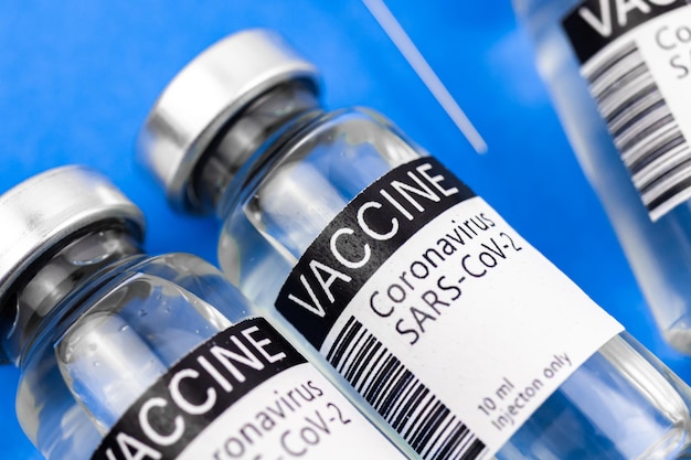Фото Процесс производства новой вакцины, концепция, фоновая фотография vacconation