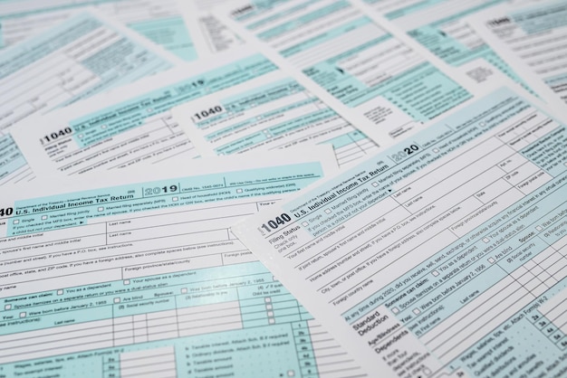 Photo many 1040 us tax form as business background government