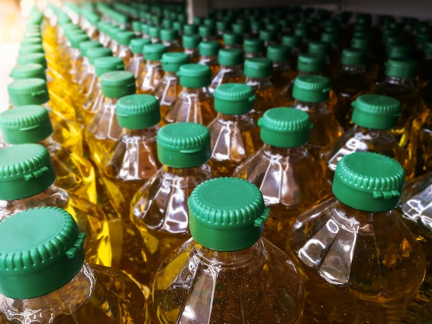 Photo many bottles in row stack of vegetable oil