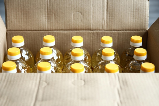 Many bottles of sunflower oil background