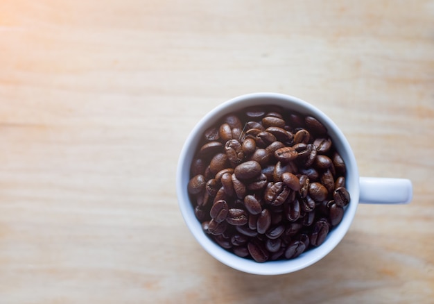 Many coffee beans in the glass