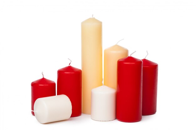 Many colorful candles isolated on white 