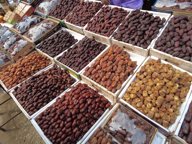 Many date fruits display for sale at local market