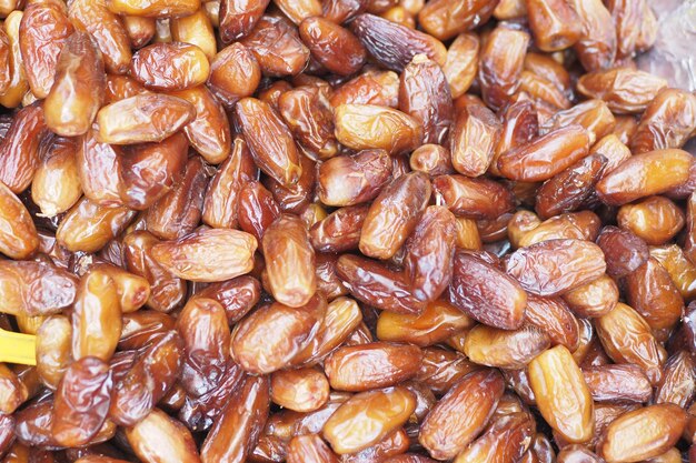 Many date fruits display for sale at local market