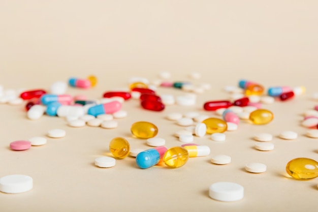 many different colorful medication and pills perspective view set of many pills on colored background