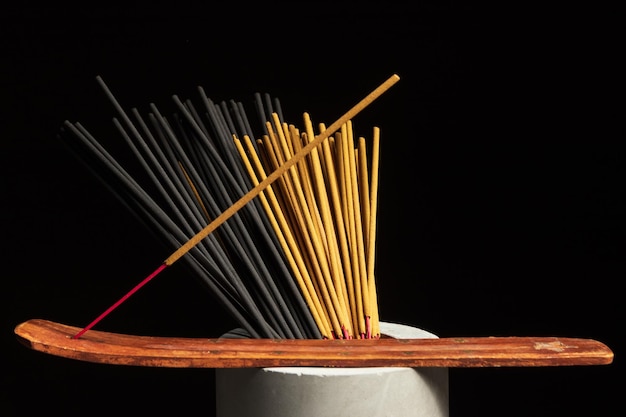 Many different incense sticks with stand ready to use