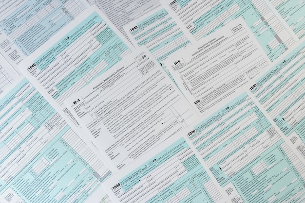 Many different usa tax form. w4 w9 and 1040 form for fill in\
april. tax time