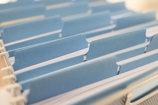 Many file folders in a row as background close up of catalog cards