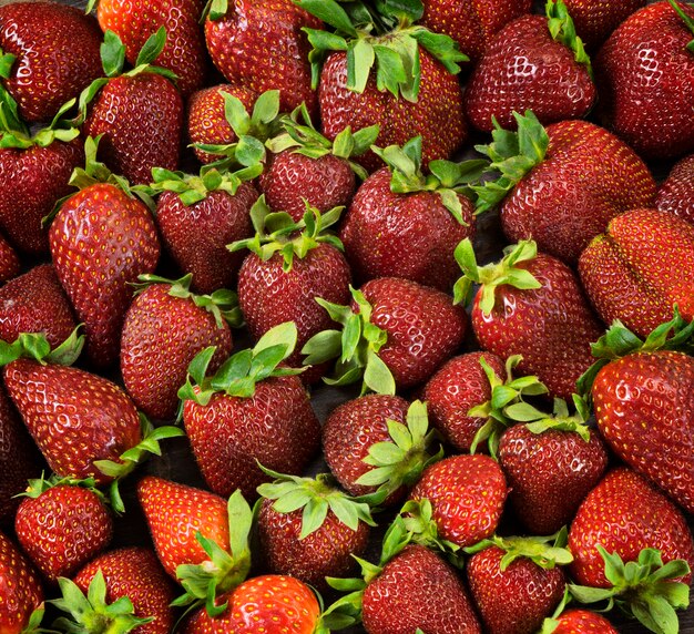 Many Fresh, natural and ripe strawberry berries.