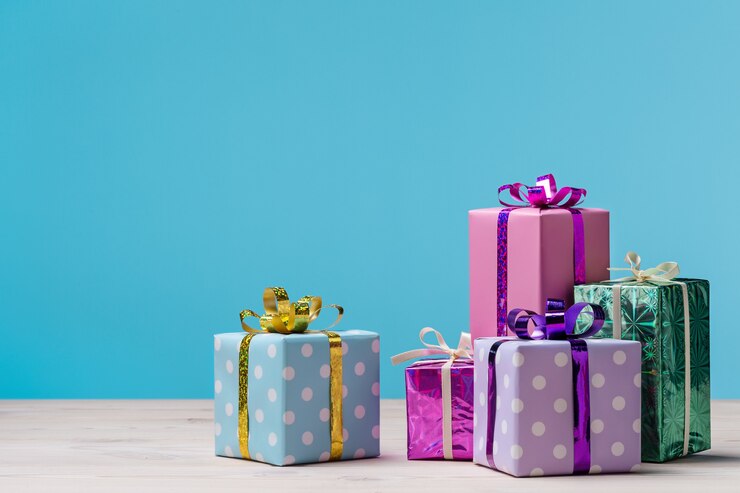 Many gift boxes on blue background.