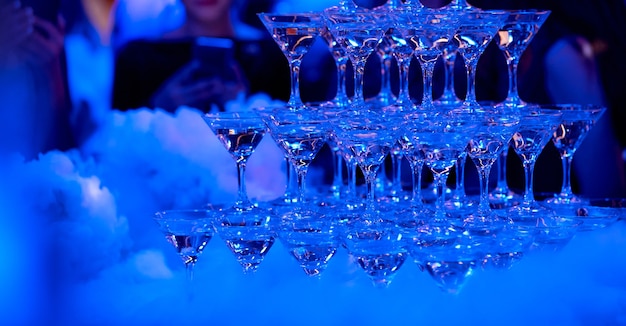 Many glasses on a table with alcohol and without with liquid nitrogen. high quality photo