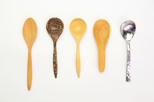 Many kind spoon on white background