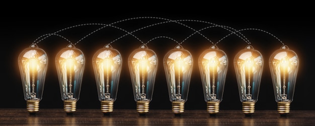 Many light bulbs interconnected on dark background