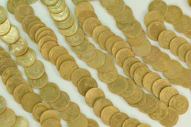 Many old 5 coins of the Soviet Union Communist Russia the money of the USSR on white background Top view Round Capital Collector Monetary National Socialism Communism Symbol Pay Retro