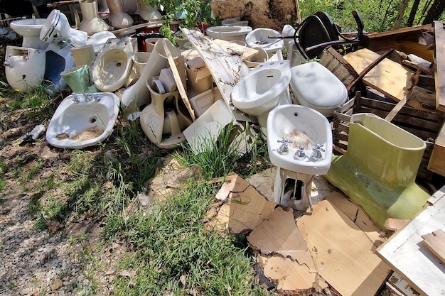 Many old abandoned ceramic toilet wc sinker