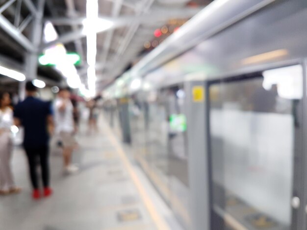 Photo many people queue wait for the skytrain blur background