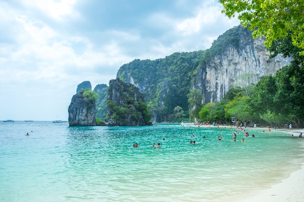 Many people swimming and relaxing at Hong Island in Krabi Province Thailand. 