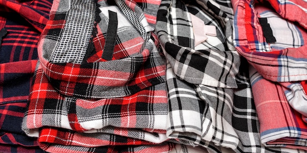 Many plaid shirts