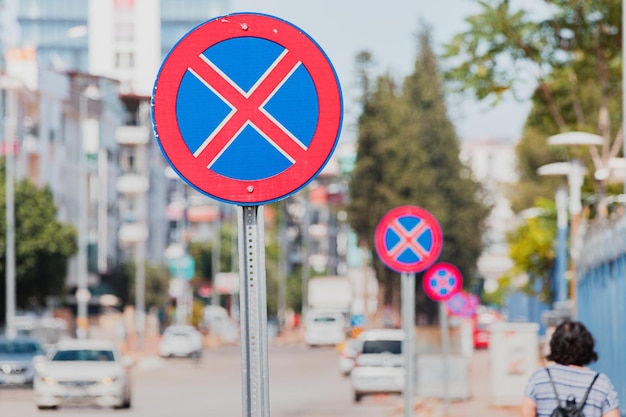 Many Road signs prohibiting parking and stopping Traffic laws and urban development