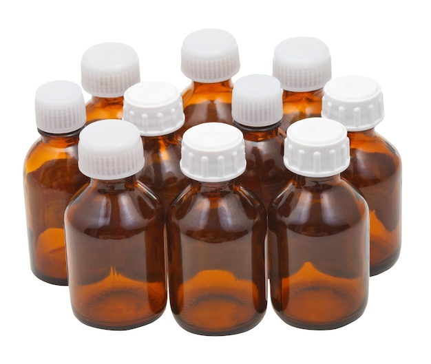 Many small closed brown glass pharmacy bottles