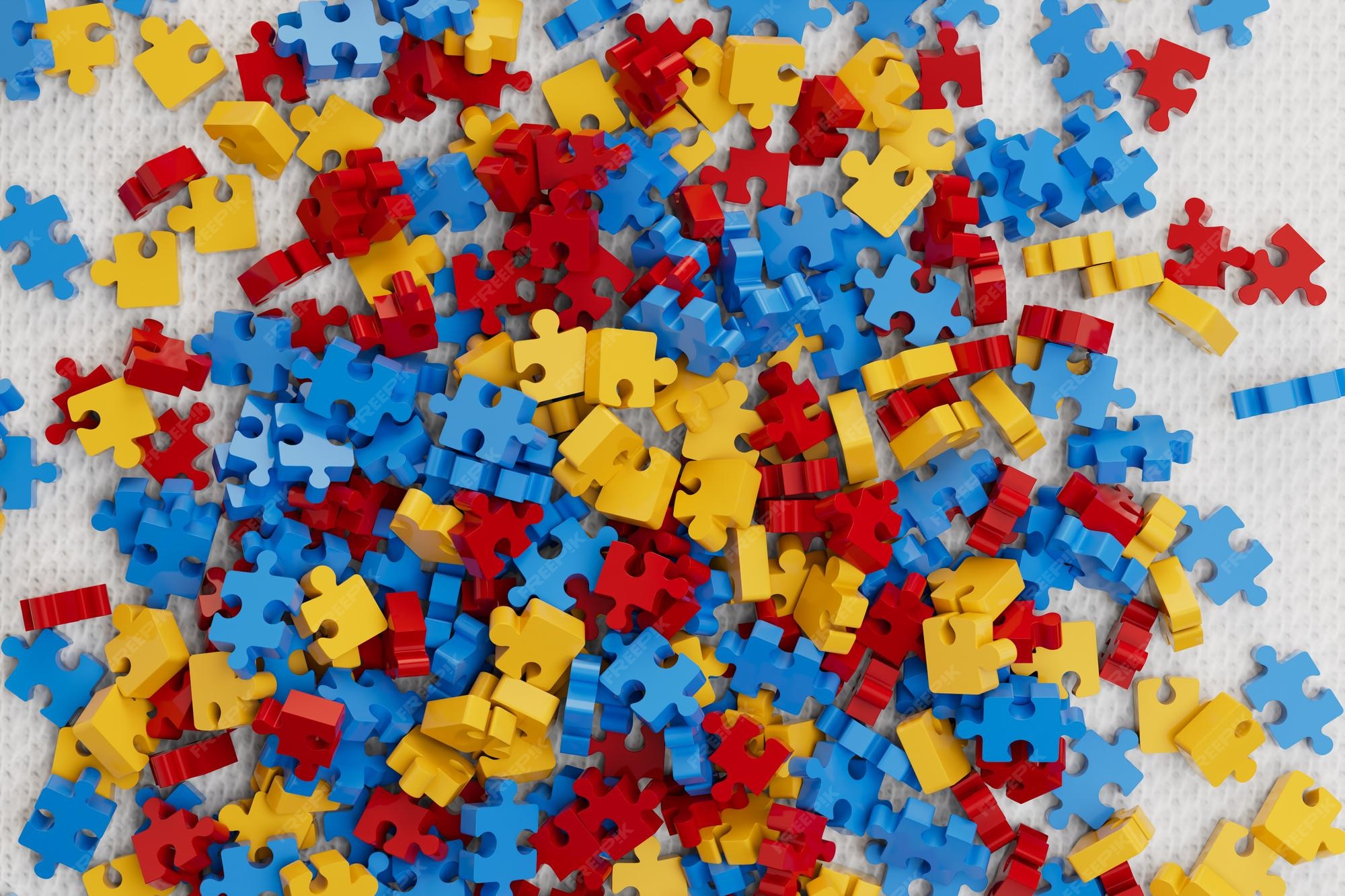 Premium Photo | Many small multi-colored puzzle pieces of different