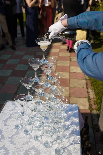 Many wedding glasses with sparkling wine in restaurant