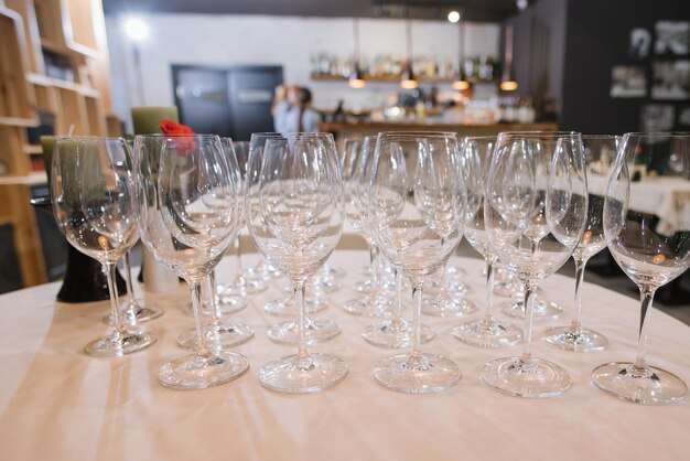 Many wine glasses on the table