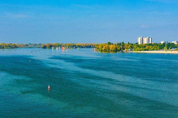 Many yachts at the river Dnieper on autumn in Kremenchug Ukraine Sailing regatta