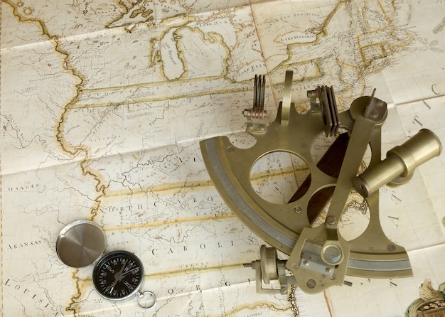 Photo map, sextant and compass
