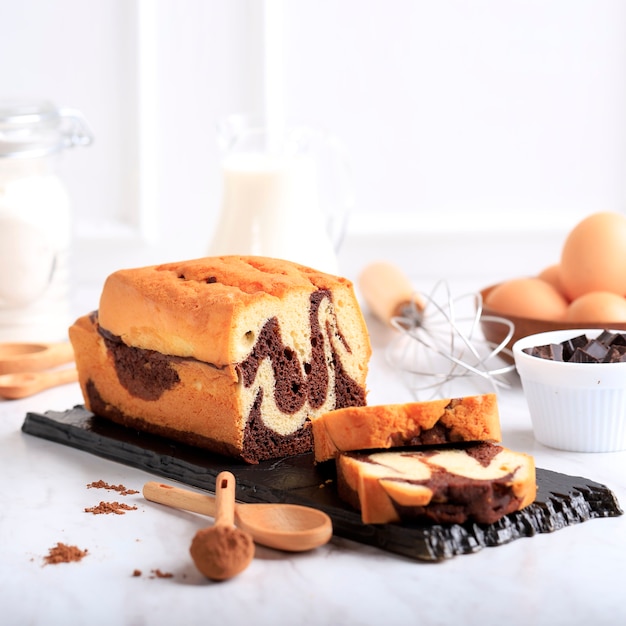 Marble Chocolate Cake with Baking Ingredients, White Bakery Concept