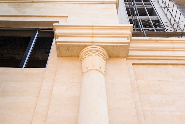 Photo marble column of a building under construction, details