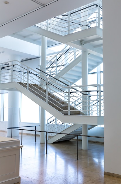 Marble floor and metal staircase.