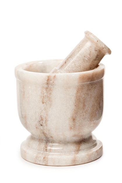 Marble mortar and pestle on white