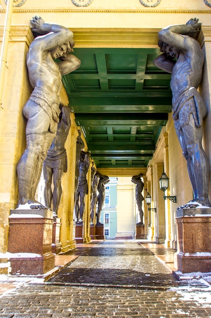 Marble statues of Atlant's hold ceiling of New Hermitage, St. Petersburg, Russia