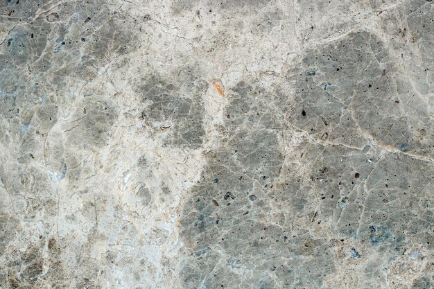 Marble stone texture with varied pattern with fine lines.