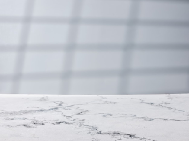 Marble table on gray wall background