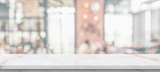 Marble table top with blurred kitchen cafe restaurant interior background