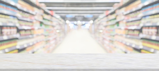 Marble table top with supermarket grocery store blurred background