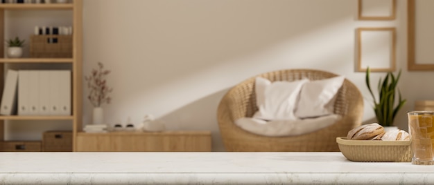 Marble tabletop with set of light meals and empty space for montage over blurred Scandinavian living