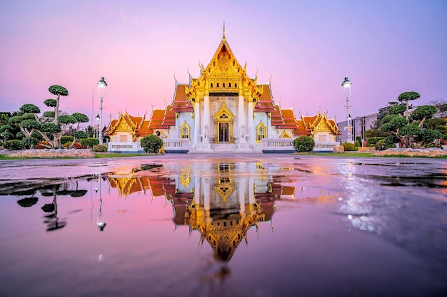 Marble Temple of Bangkok Thailand The famous marble temple Benchamabophit Is a popular tourist destination in Bangkok And is an important Buddhist place Evening atmosphere