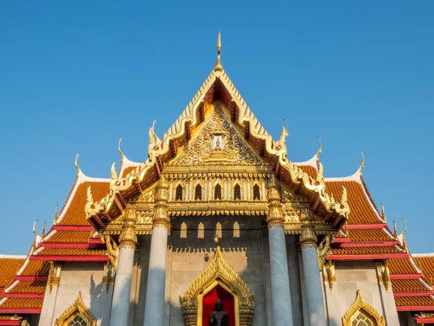 The Marble temple church building Wat Benjamabophit Bangkok Thailand under evening sky