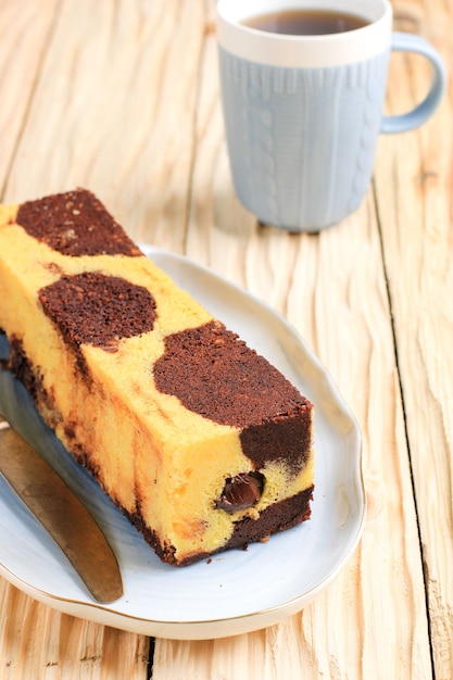 Marble Travel Cake, Mini Loaf Marble Cake with Melted Chocolate Inside. Also Known as Tube Cake. Served on White Plate