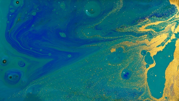マーブル青の抽象的な背景 黄金の粉末の液体大理石のパターン