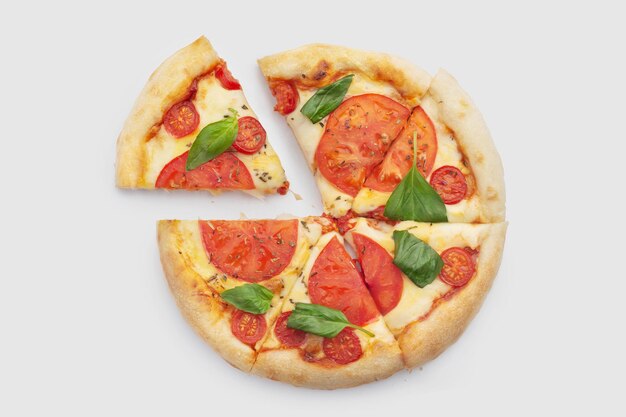 margarita pizza with basil on white background