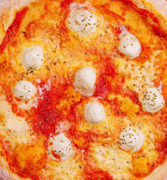 Margherita pizza with mozzarella and tomato sauce